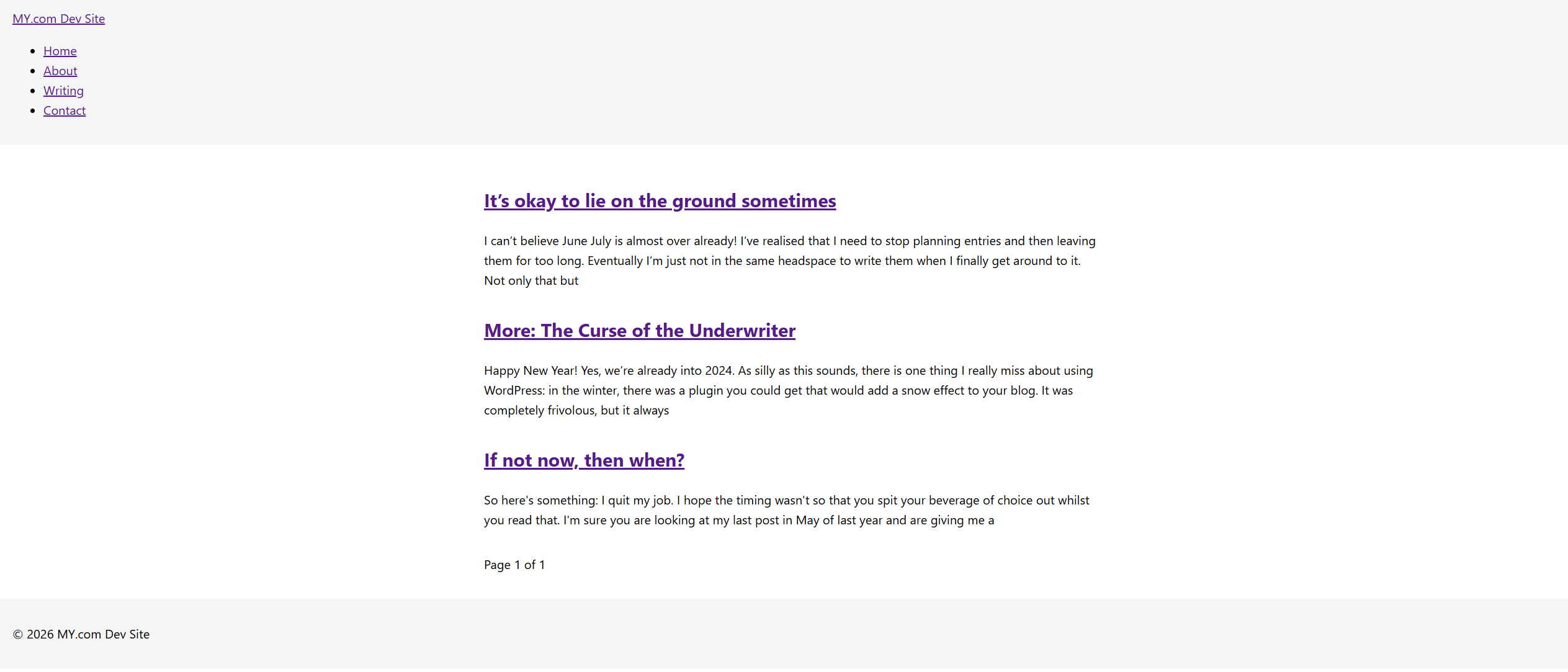 Screenshot of a blog layout in development with a grey headers and footer. Blog content is centred in the middle with three post excerpts.